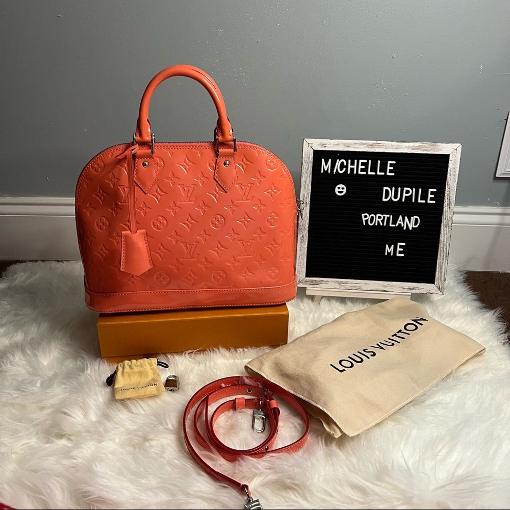 Louis vuitton alma pm poppy color with strap